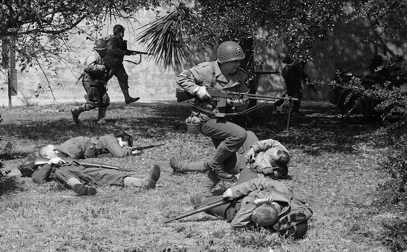 IMGP6506RS.JPG - BAR gunner advancing over the wounded during the final assault on the fort.